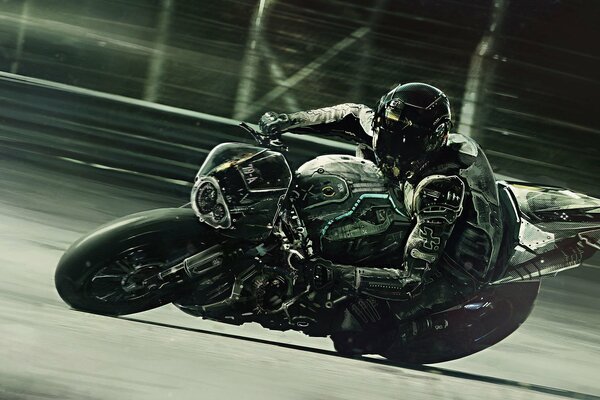 Motocyklista na czarnym sportowym motocyklu z prędkością wjeżdża w zakręt