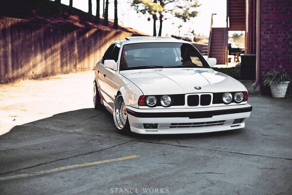 White BMW on a deserted street