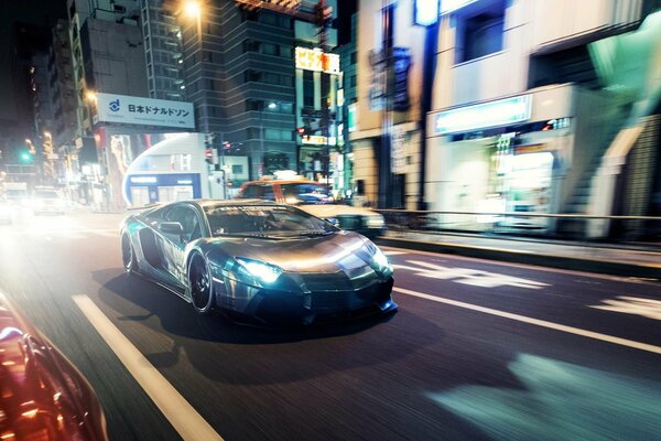 Lamborghini rushes through the night city