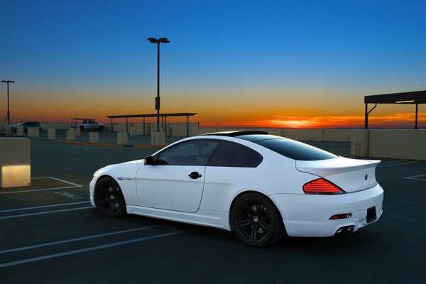 How good is my white BMW on the background of the sunset from the side