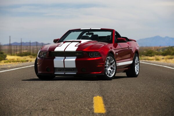 Sporty red Ford Mustang with white stripes