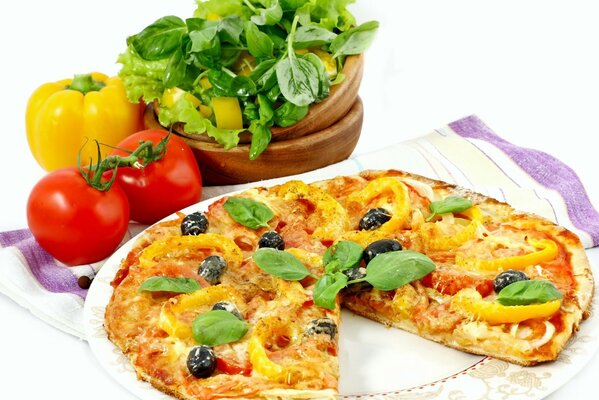 On a white background is a pizza with delicious vegetables