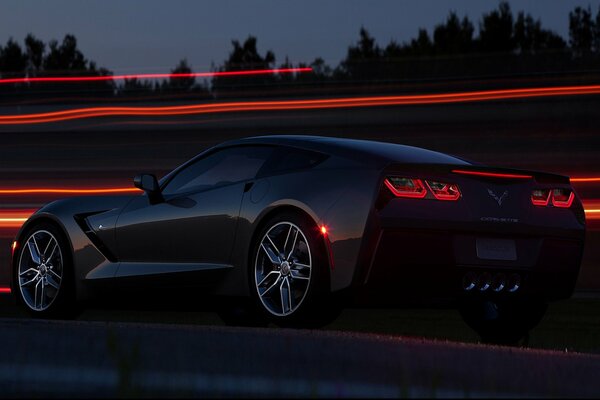 Black Chevrolet Stingray c7. Night track