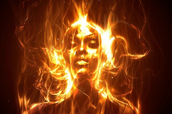 Beautiful girl in the flicker of fire