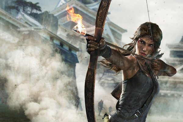 Główny bohater gry Tomb Raider strzela z łuku strzałą z ognistą końcówką