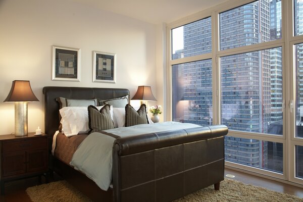 Bedroom in a city apartment in a high-rise