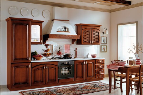 Design of a wooden kitchen with a hood