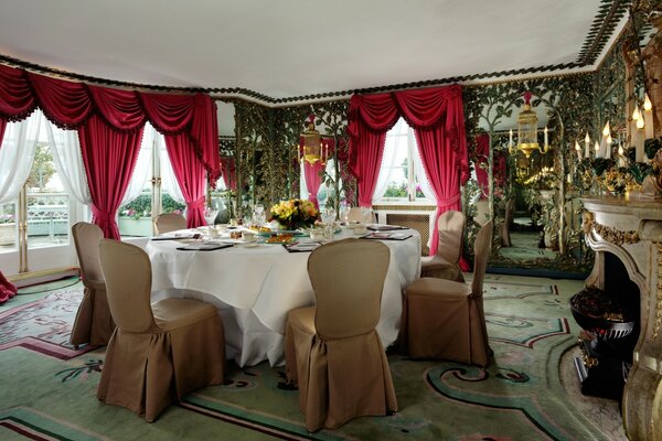 Dining room-salon in chamber style. CURTAINS IN THE interior