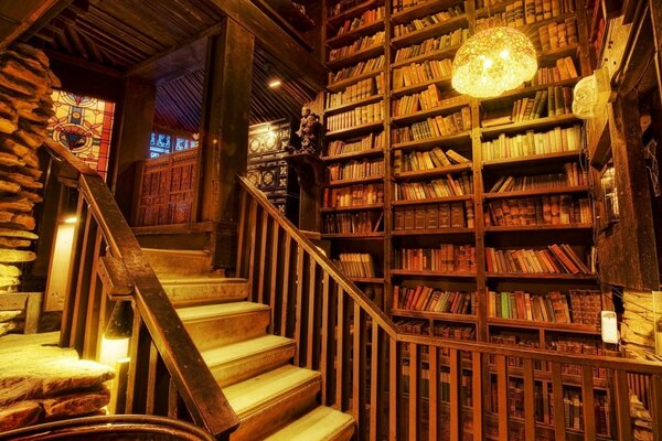 Wooden staircase leading to the library