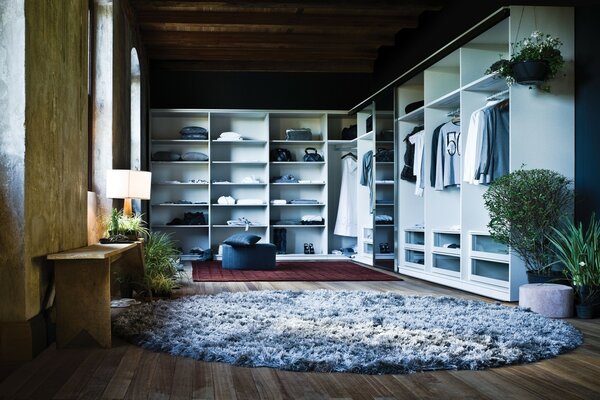 Spacious dressing room in light blue tones