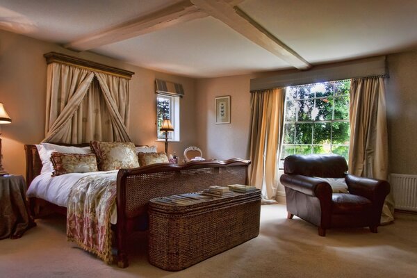 Stylish bedroom with a large window