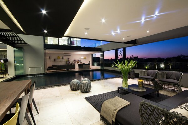 Unusual home interior with full-length panoramic windows