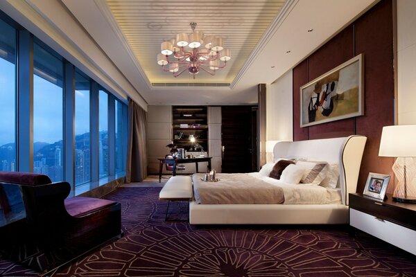 Design of the bedroom room in purple tones