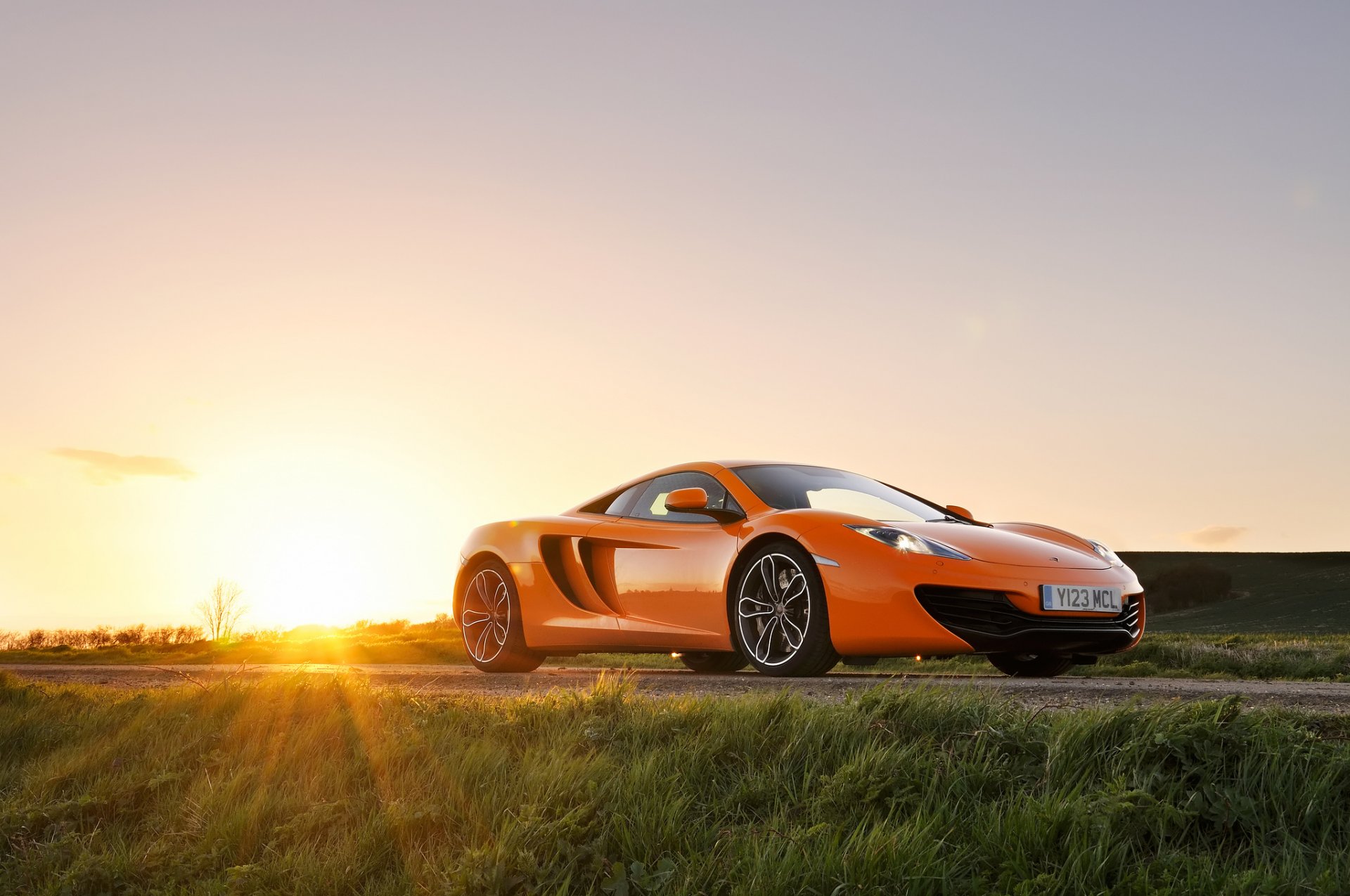 mclaren mp4-12c arancione anteriore mclaren sole abbagliamento