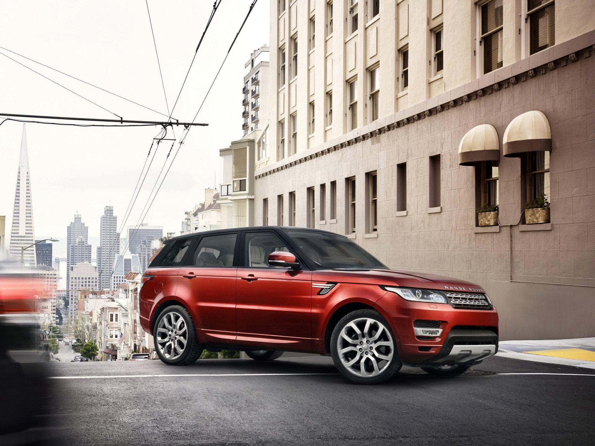 land rover range rover suv rouge ville