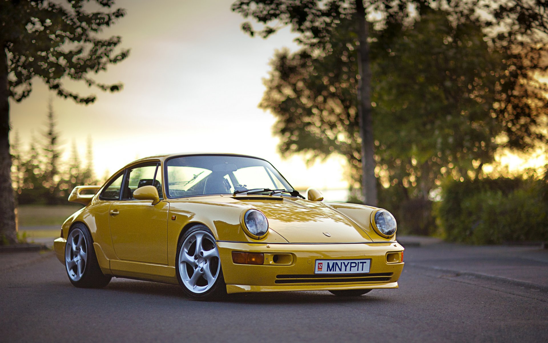 porsche 911 carrera 4 supercharged yellow