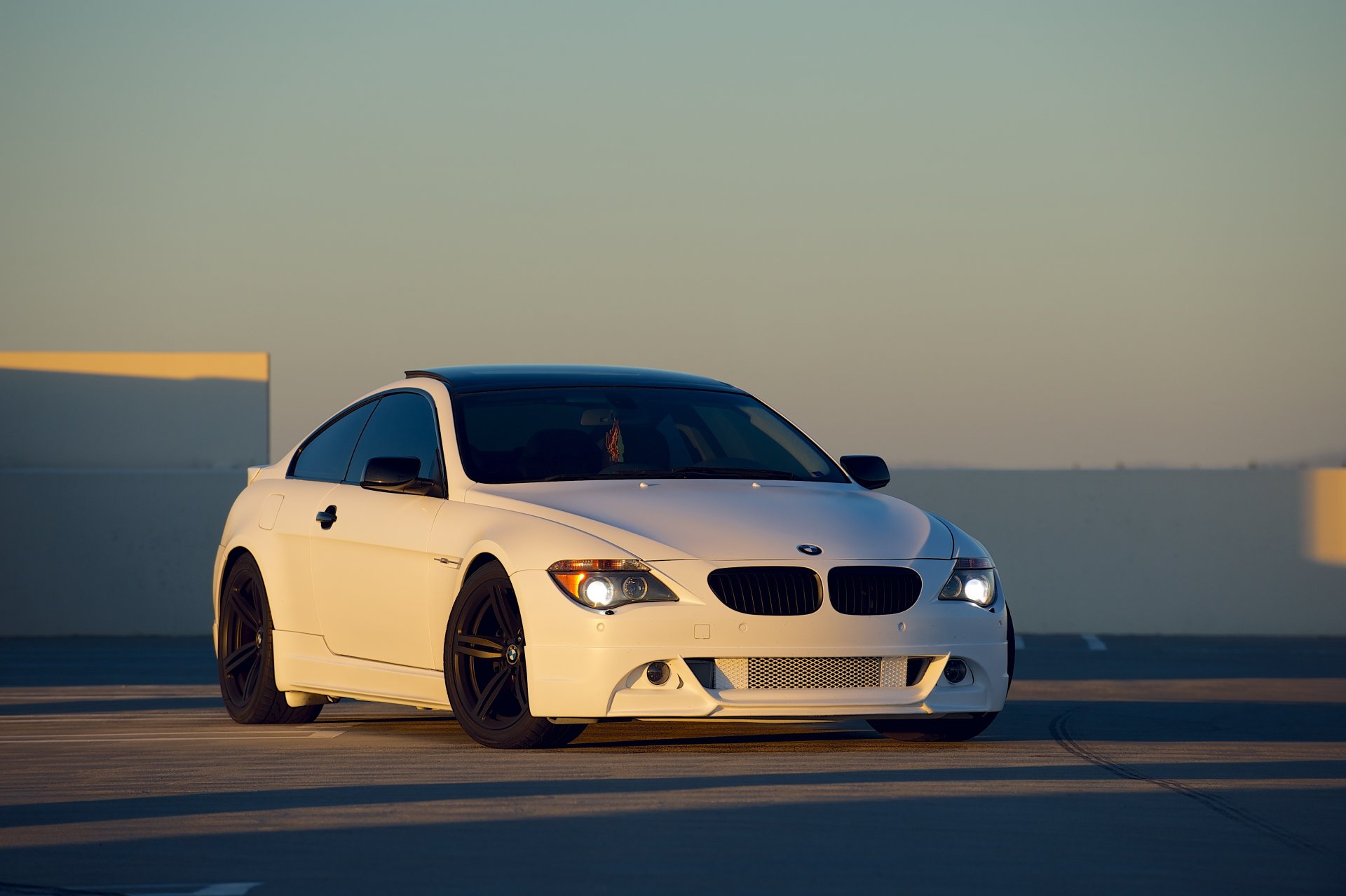 bmw m6 e63 weiß sonnenuntergang bmw vorderansicht