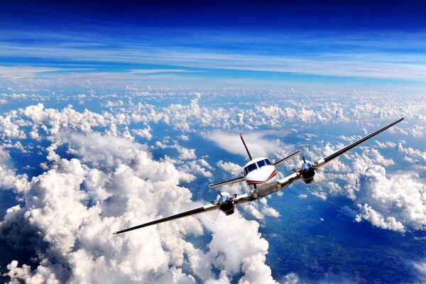 A plane in a cloudy sky