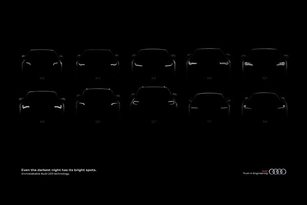 Model range of cars on a black background