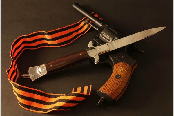 Composition of a revolver and a St. George ribbon