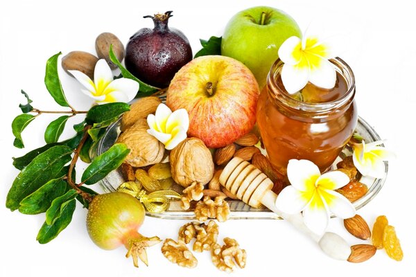 Still life of honey nuts and apples