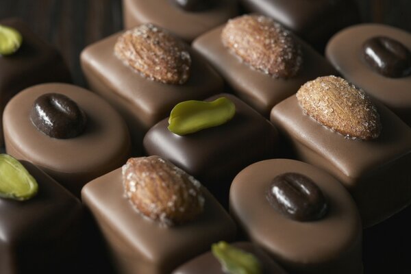 Assorted candies with icing and nuts