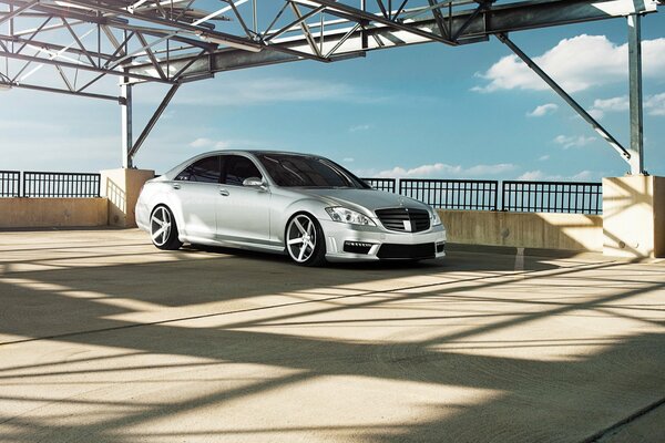 Silver new Mercedes. Mercedes-benz s550. Beautiful sky