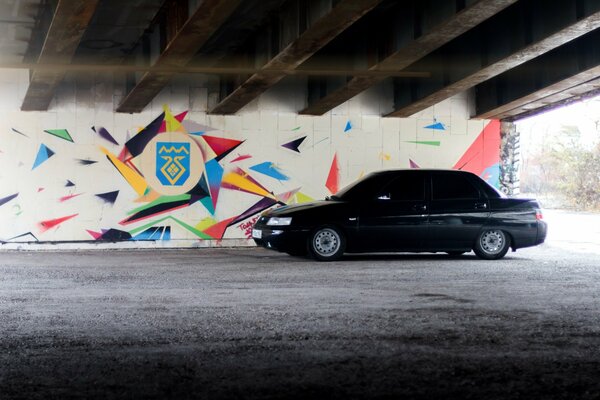 Lada on the background of colored graffiti