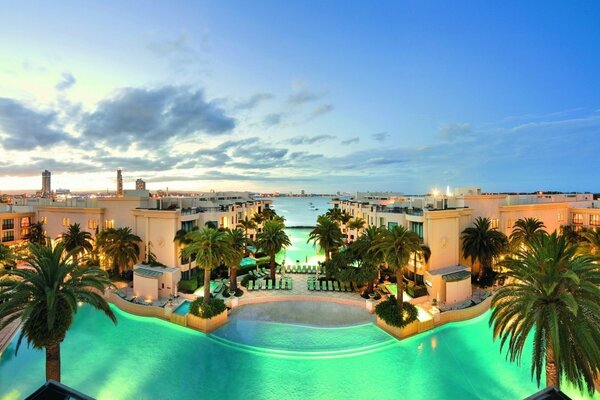 Rest at the hotel. Pools and palm trees