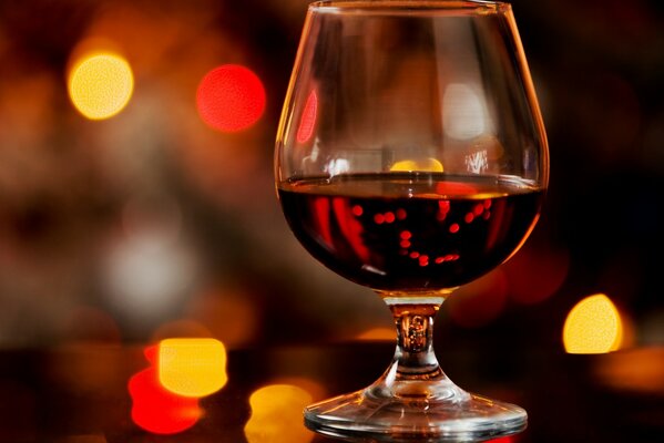 Glass of red wine bokeh