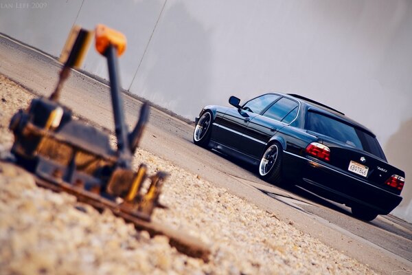 Black boomer from a beautiful angle. Black BMW 740