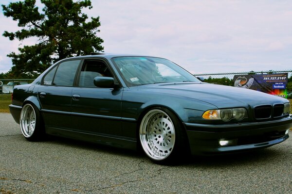 Bmw 740 with tuned discs at the automobile exhibition