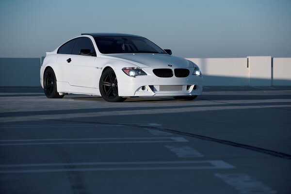 White BMW m6 white in the parking lot