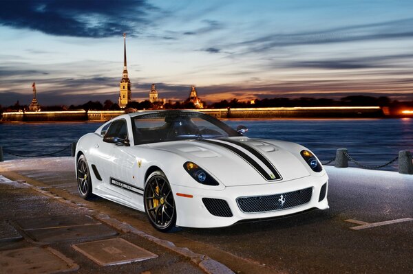 Gorgeous view in the evening from the river embankment in a 2-seater sports car