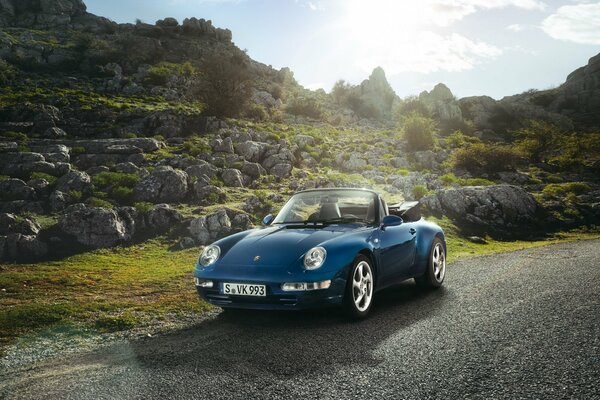 Porsche convertible in the highlands