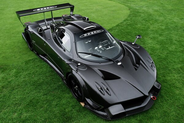 An unusual supercar with aggressive carbon black contours