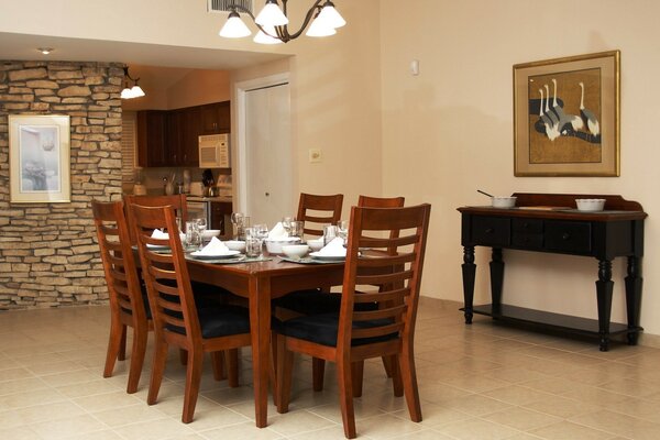 Design of the dining room kitchen with tables and chairs