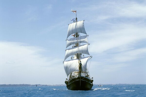 A ship at sea and a blue sky