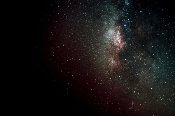 Eine Galaxie im Weltraum. Dunkles und dunkles Foto