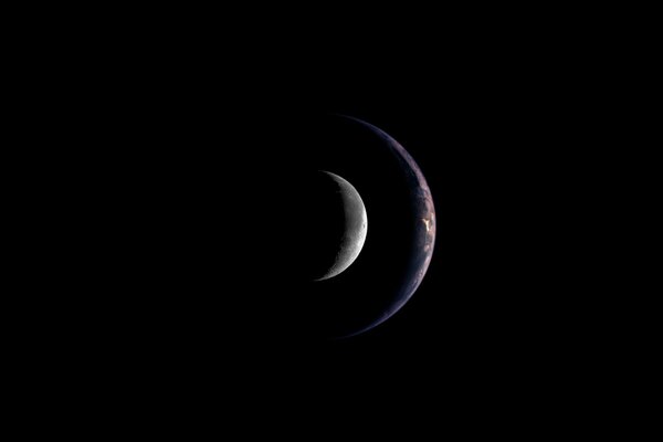 Vista de la tierra y la Luna desde el espacio