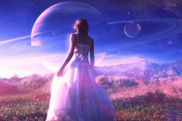 A girl in a dress looks at the sky from the planets