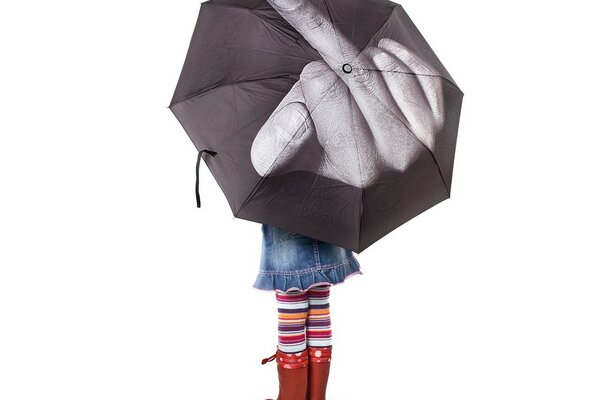 The girl holds an umbrella with a torch