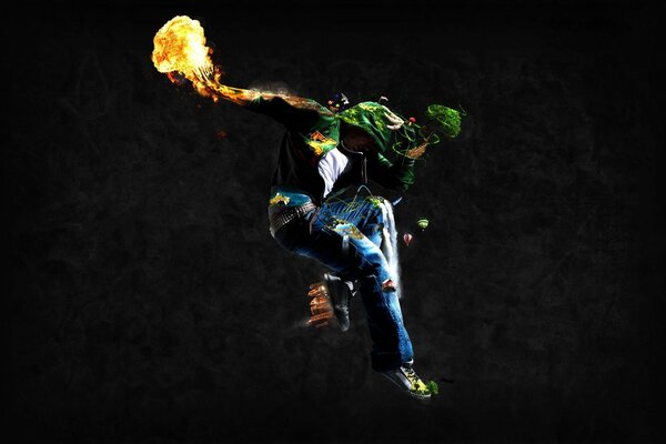 On a black background, a guy with a fire in his hand