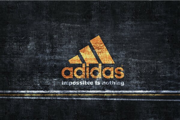 Znak i litery firmy Adidas na czarnym tle