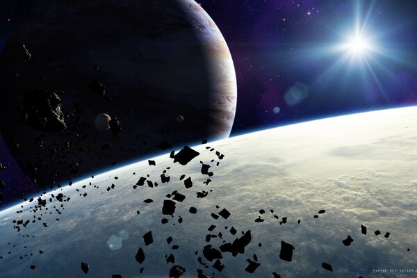 Asteroids on the background of the planet and the sun