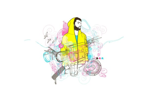 A bearded man in a yellow hoodie