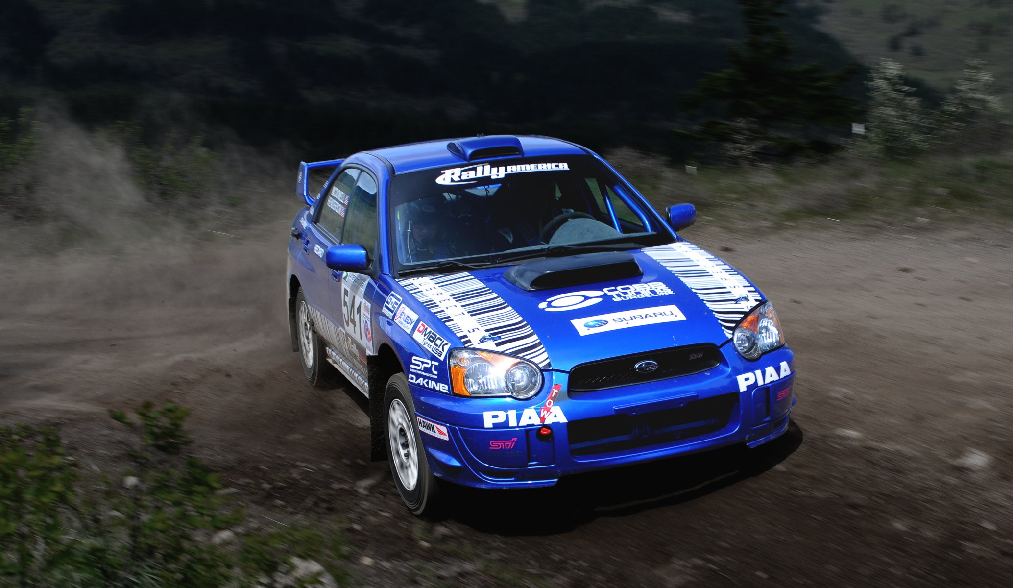 ubaru impreza wrx blue wrc rally rally skid turn front end auto car