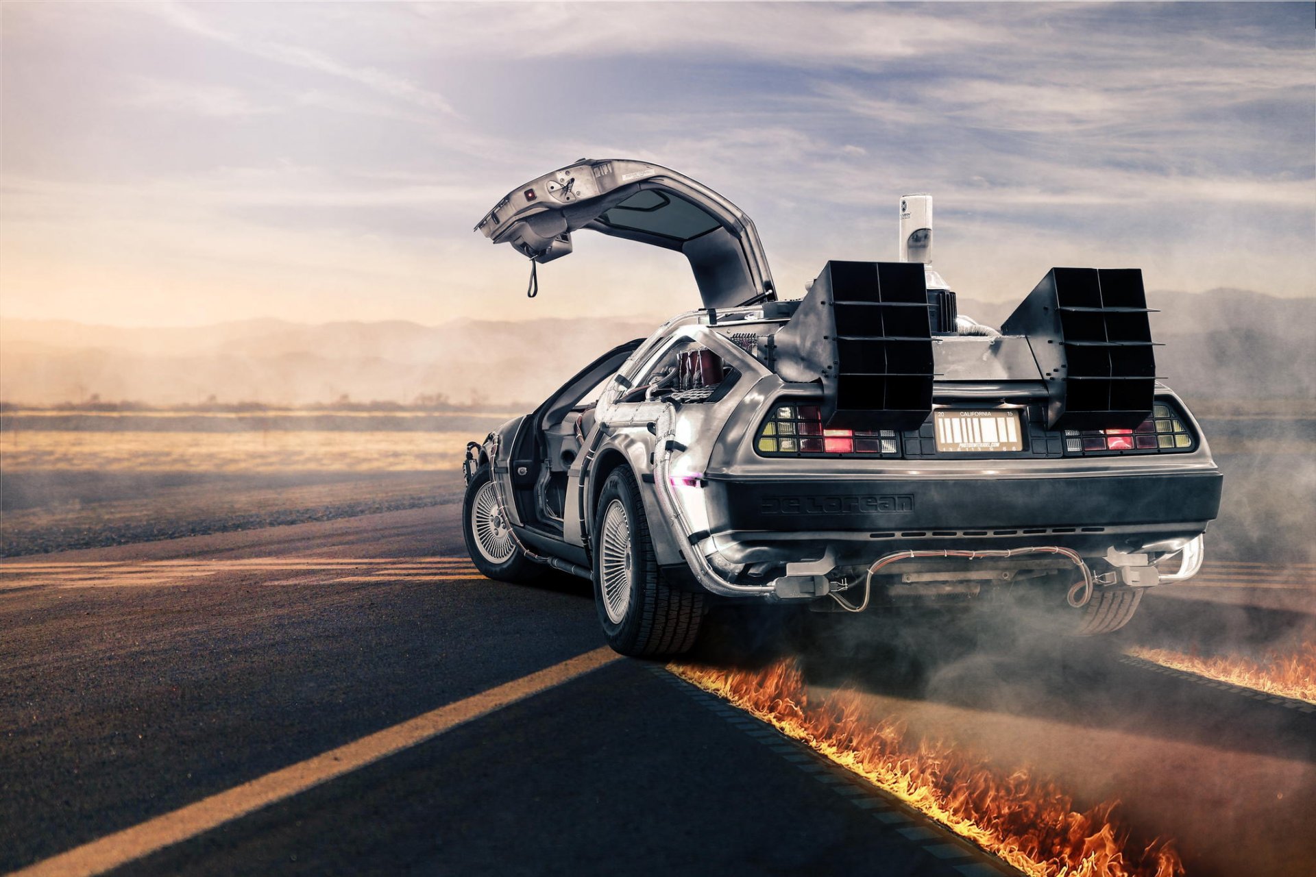 delorean dmc-12 srebrny tył powrót do przyszłości droga ogień delorean srebrny płomień