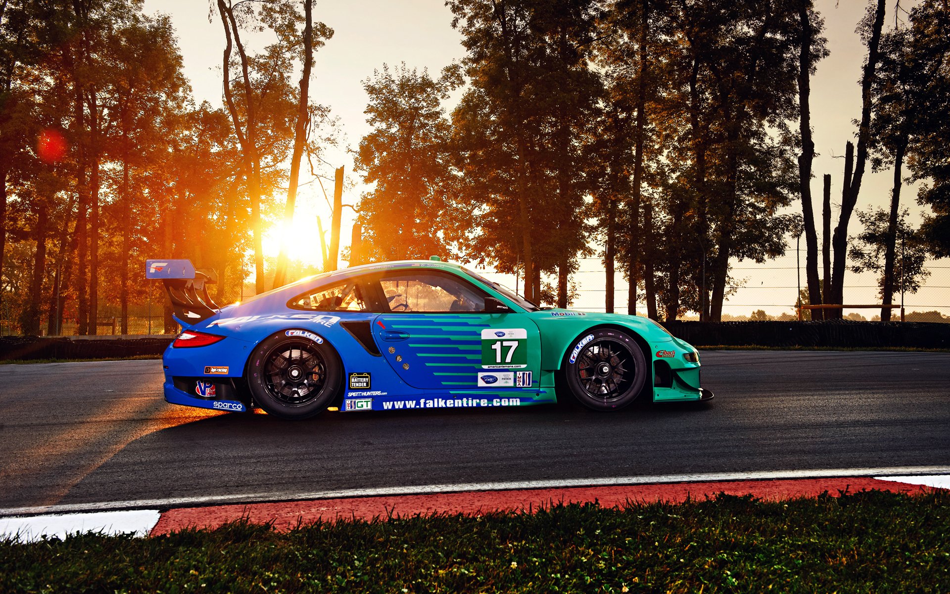 porsche 911 gt3 rsr sportwagen falken wettbewerb widebody track spoiler sonne bäume