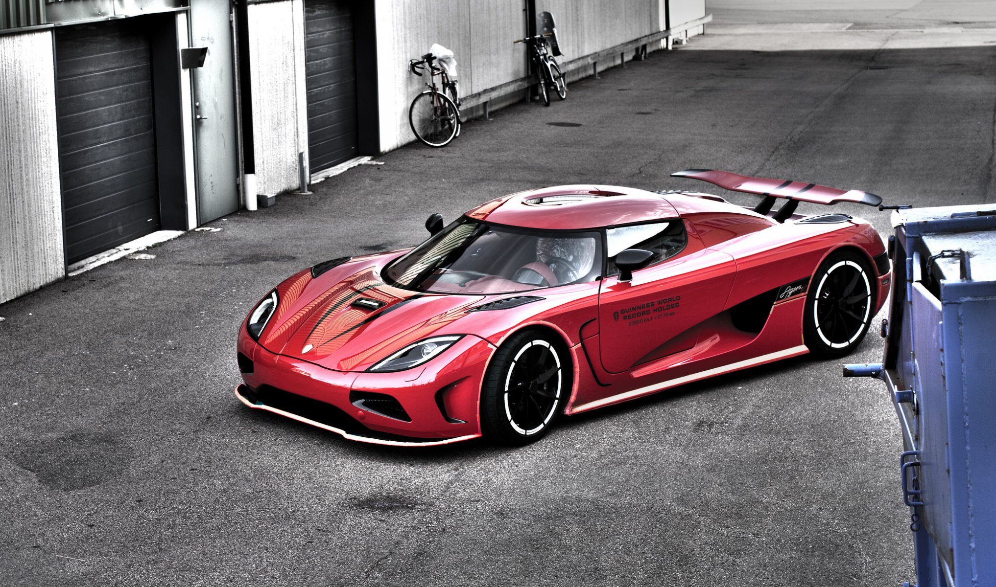 koenigsegg agera r red supercar bicycle ager river bike building